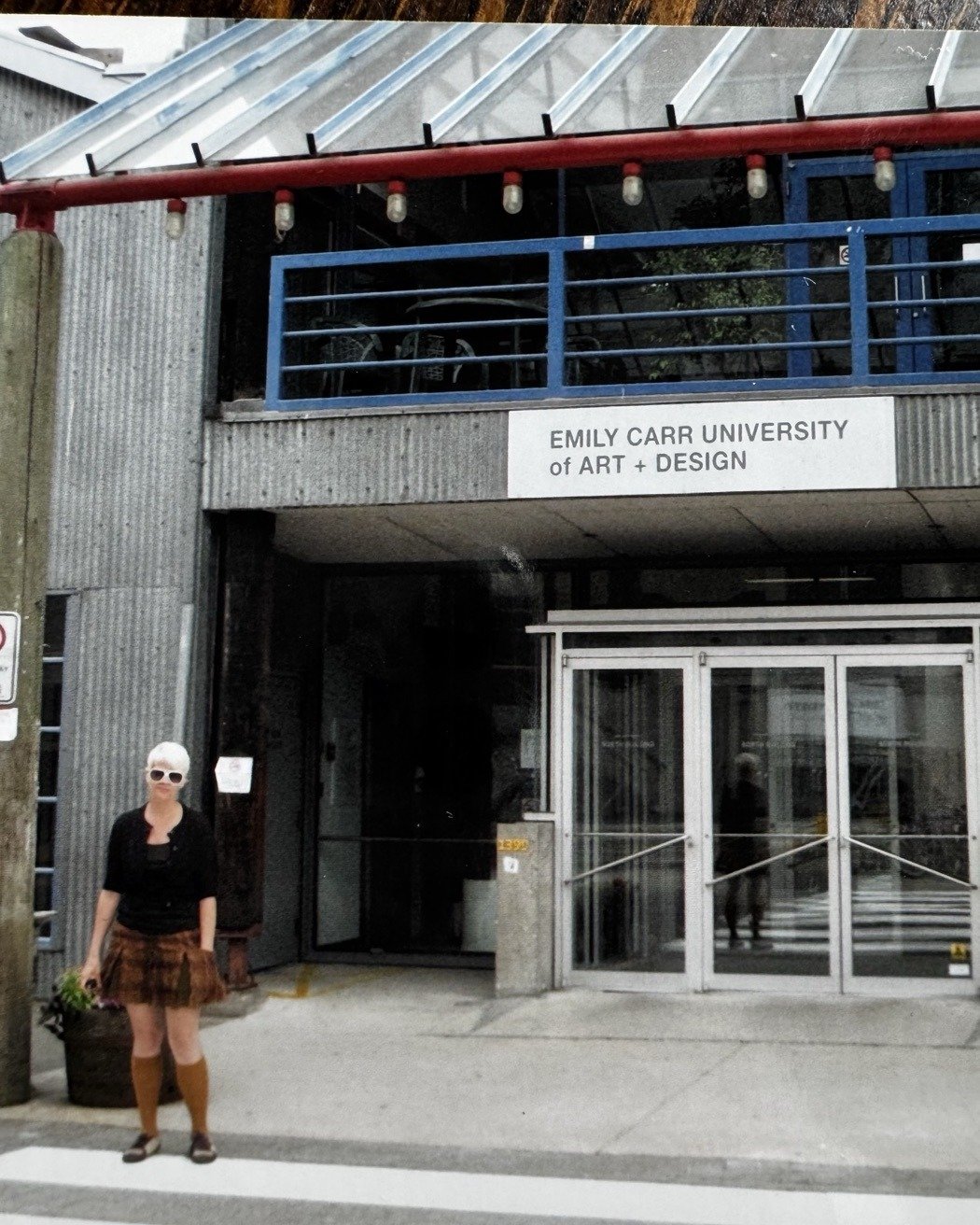 Lara outside Emily Carr University of Art and Design on graduation day